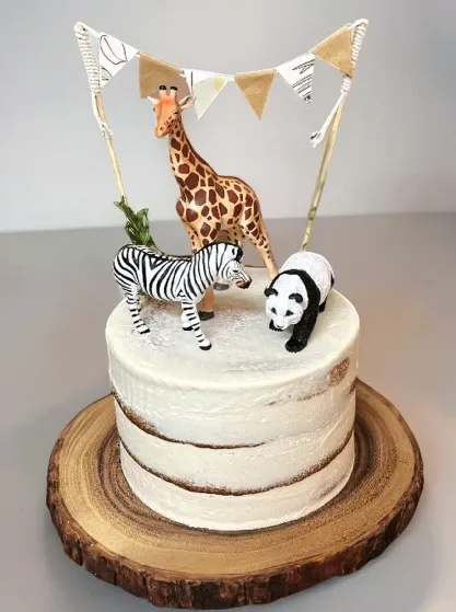 naked fondant cake with toy animals
