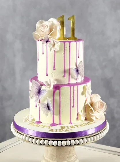 classic pink drip princess cake 2 tiers