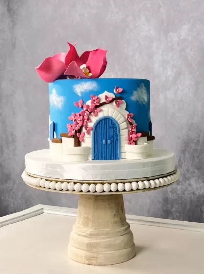 enchanted fairytale celebration cake with an imagination inspired door